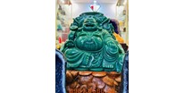 Tượng phật di lặc bằng đá xanh
